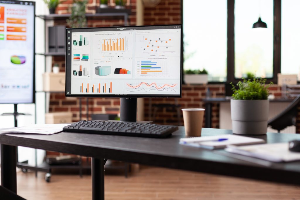 empty office desk with business data charts on com 2026 01 08 02 20 11 utc - Paid Digital Advertising